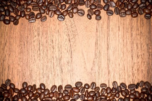 coffee beans on teak wooden table, vintage style