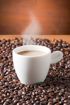 Coffee cup and coffee beans, vintage style