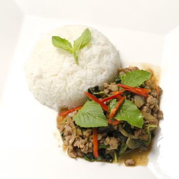 Thai main food Rice topped with stir-fried pork and basil