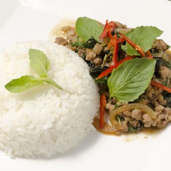 Thai main food Rice topped with stir-fried pork and basil