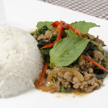 Thai main food Rice topped with stir-fried pork and basil