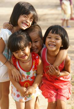 MEKONG DELTA, VIET NAM- SEPT 20: Group of unidentified Asian children have fun at Vietnamese country in sunny day, pretty, lovely face with innocent smile of Mekong Delta kid, Vietnam, Sept 20, 2014