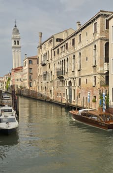 Leaning tower  in canal of Venice, Italy.