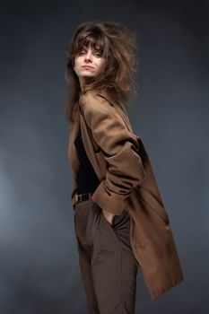 Portrait of a Young Woman in Brown Coat