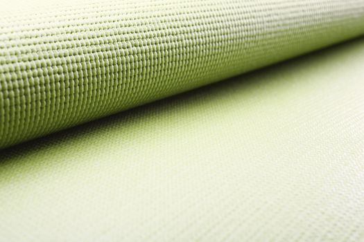 Close up of green yoga mat. 
macro shot
