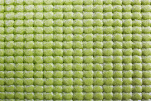 Close up of green yoga mat. 
macro shot
