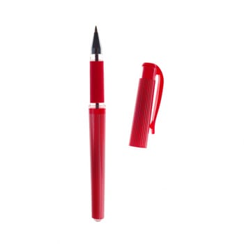 Red ballpoint pen isolated on white background.