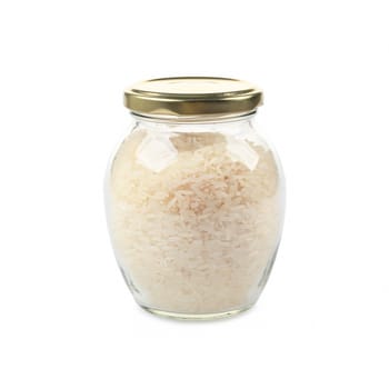 White rice in glass jar isolated on white background.