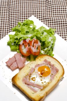 breakfast food menu egg in a hole with salad