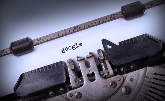 Vintage inscription made by old typewriter, Google