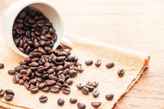 Coffee cup and coffee beans