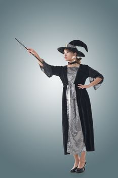 Asian witch hold something, full length portrait isolated.