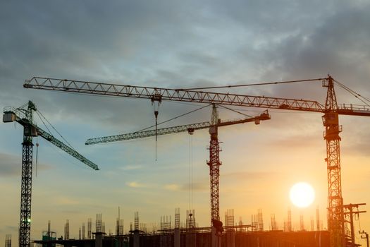 construction crane on sunset