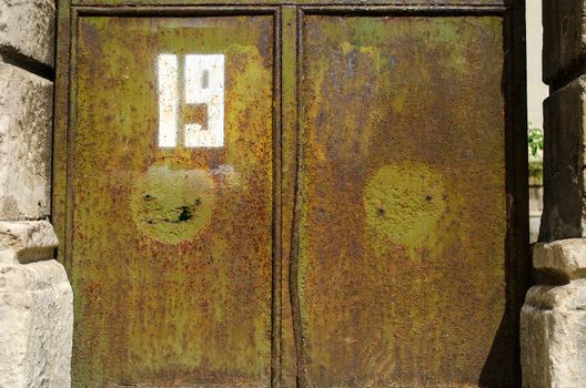 Old weathered wooden garage door