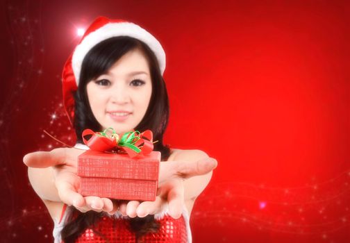 pretty women in santa outfit and christmas background