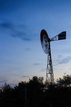old windmill on sunset