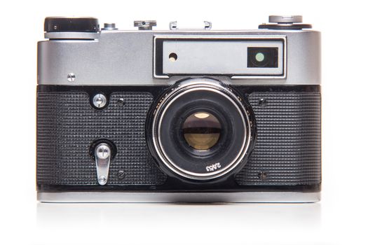 Classic 35mm old analog camera on white - studio shoot 