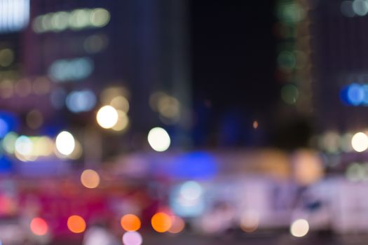 Abstract urban background with blurred buildings and street, shallow depth of focus.