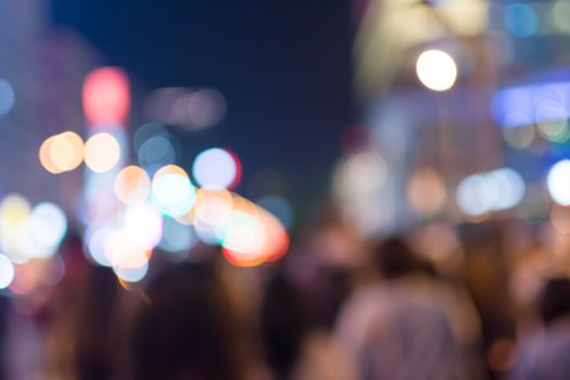 Abstract urban background with blurred buildings and street, shallow depth of focus.