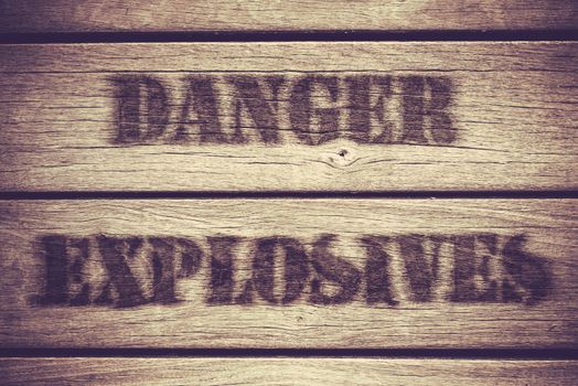 A Retro Grungy Crate Labelled With Danger Explosives