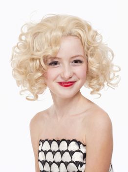 Portrait of a Young Girl with Blond Wig Posing as Marylin Monroe