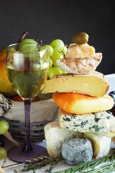 French Cheese, wine and fruits conceptual composition