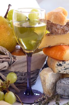 French Cheese, wine and fruits conceptual composition