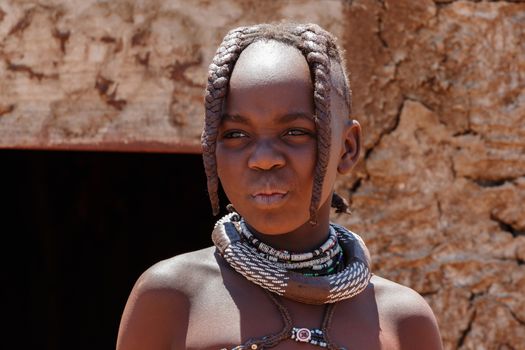 NAMIBIA, KAMANJAB, OCTOBER 10: Unidentified child Himba tribe. The Himba are indigenous peoples living in northern Namibia, in the Kunene region of South-West Africa on october 10 2014 