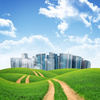 Tall buildings, green hills and road against sky with clouds. Architectural concept