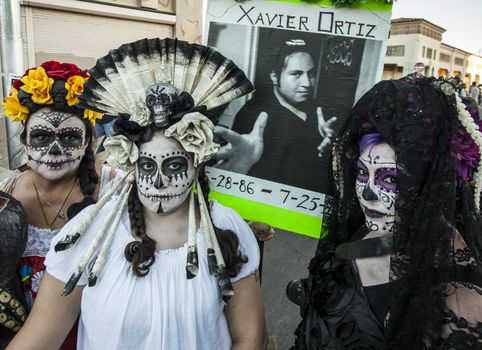 TUCSON, AZ/USA - NOVEMBER 09: Three undientified women at the All Souls Procession on November 09, 2014 in Tucson, AZ, USA.