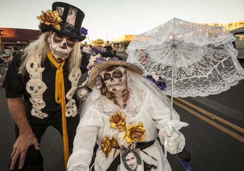 TUCSON, AZ/USA - NOVEMBER 09: Two unidentified senior people in dramatic facepaint at the All Souls Procession on November 09, 2014 in Tucson, AZ, USA.