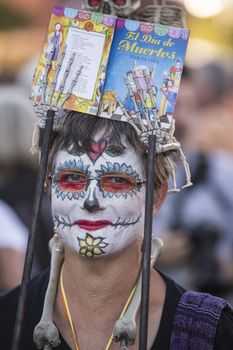 TUCSON, AZ/USA - NOVEMBER 09: Unidentified woman in facepaint at the All Souls Procession on November 09, 2014 in Tucson, AZ, USA.
