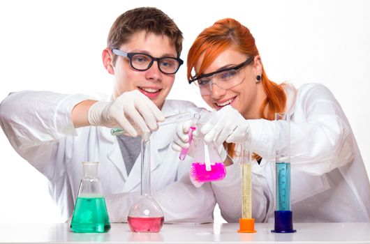 Students in chemistry lab doing reactions - studio shoot
