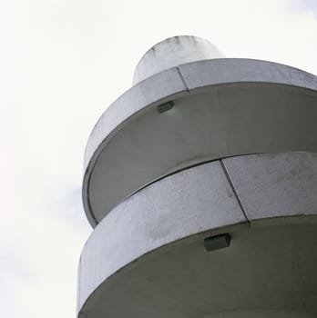 White industrial concrete spiral stairse