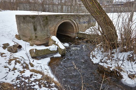 Water Canal in winter snow