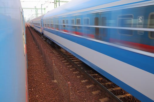 Trains pass by with motion blur