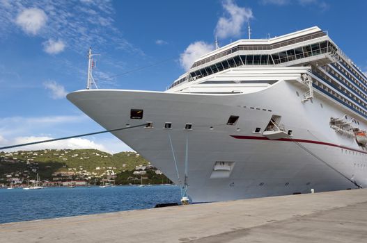 Cruise ship docked at a port in the Caribbean Sea.