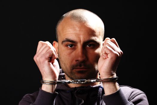 Portrait of a man with handcuffs