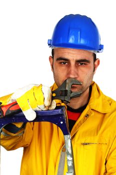 Portrait of young worker with a wrench