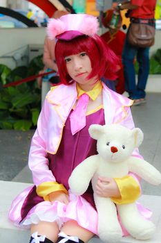 Bangkok - Aug 31: An unidentified Japanese anime cosplay pose  on August 31, 2014 at Central World, Bangkok, Thailand.