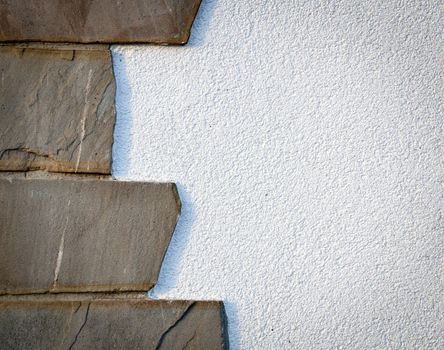 background or texture stone cladding on white wall