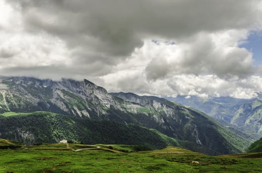 Very colorful and beautiful view over the mountains in Spain. With nice environment and cloudy sky.