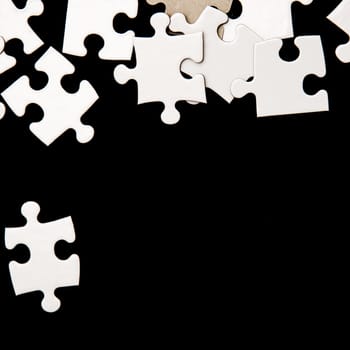 White puzzle on a black background