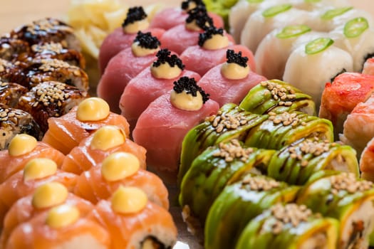 set of Japanese sushi on a white plate