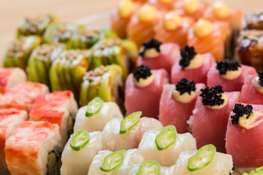 set of Japanese sushi on a white plate