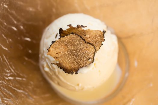 Ice Cream Sundae topped with truffle. Selective focus