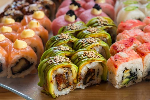 set of Japanese sushi on a white plate