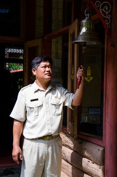 CHIANG MAI, THAILAND-OCTOBER 17: Train officer working at The Kuantan Station on October 17, 2014 in Lamphun Thailand.