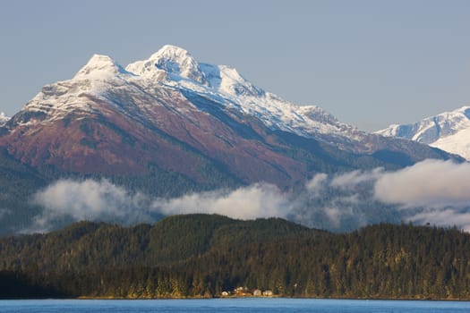 View from Douglas Island of mountains soaring above Juneau, capital city of Alaska;