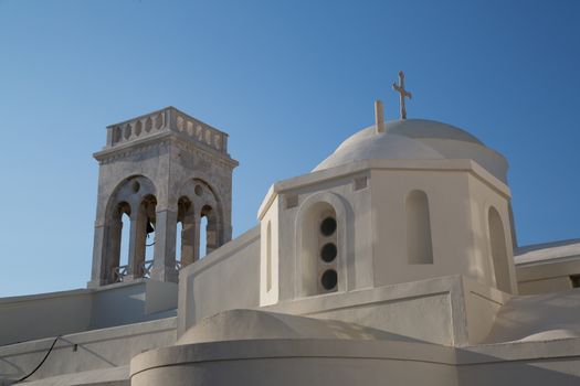 The white church on the top of Chora at the Naxos island at the Cyclades of the Aegean sea in Greece